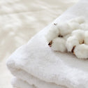 Soft white towels made from pure cotton