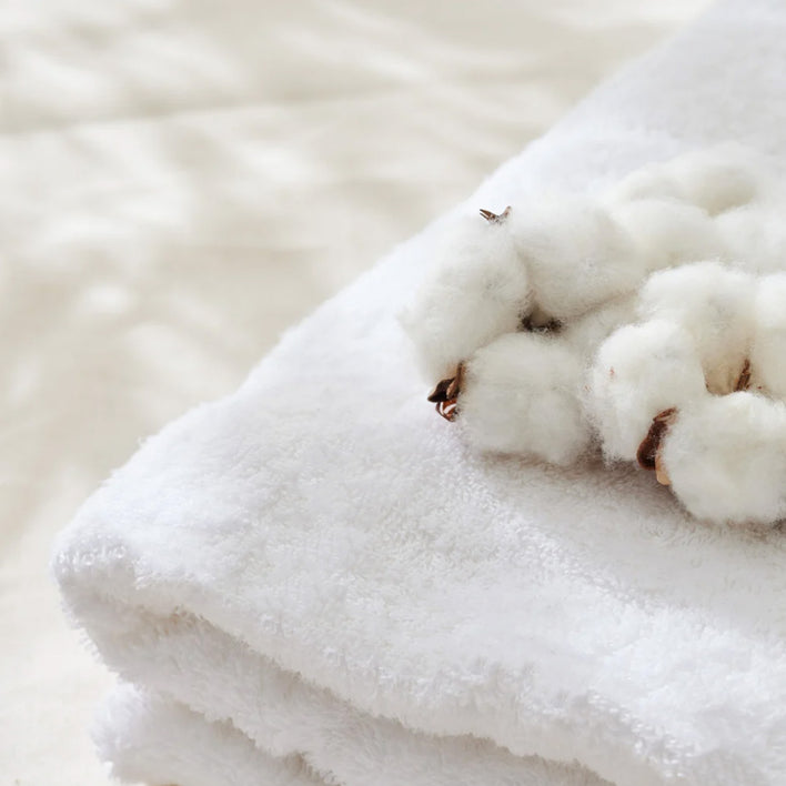 Soft white towels made from pure cotton