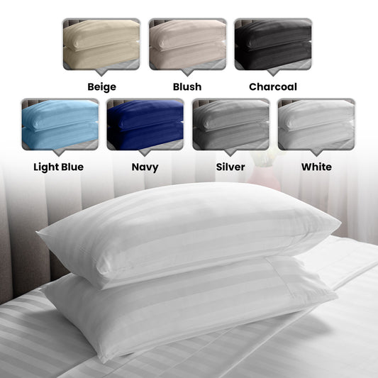 Two soft, white, cotton pillows neatly placed on each other with different colour options above.