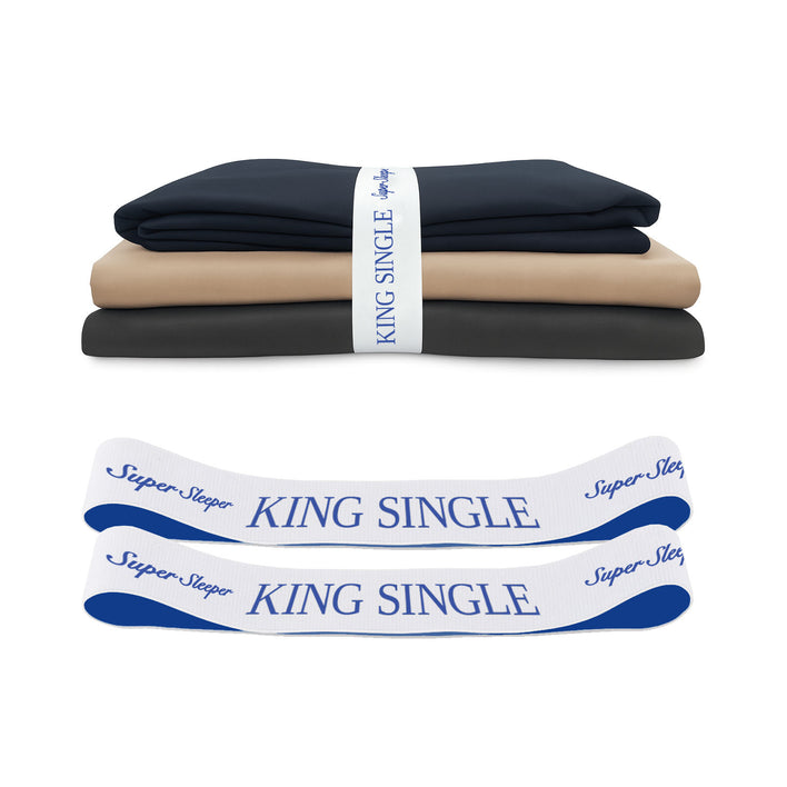 Three folded sheets in navy, beige, and charcoal are stacked with a white band labeled "King Single." In front, two Super Sleeper Pro organiser bands labeled "Super Sleeper King Single" provide a clever sheet storage solution. Product: TEST broken variant os.