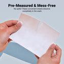 Two hands hold a single white sheet, partially torn, on a light blue background. Above, text reads: Pre-Measured & Mess-Free. No spills! Kleva Range Stain Lifting Laundry Detergent Sheets dissolve completely in the wash—eco-friendly and fresh linen scent.