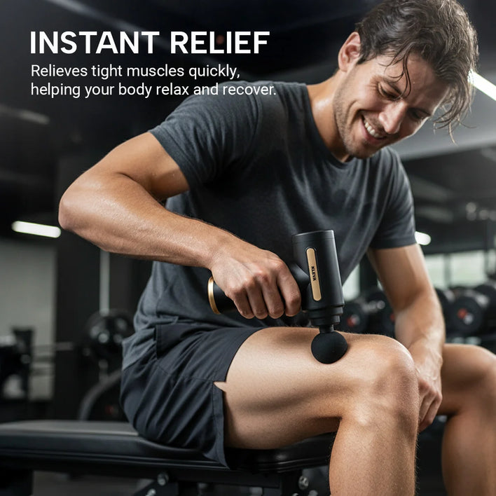 Athlete using compact massage gun on leg for post-workout muscle relief and recovery