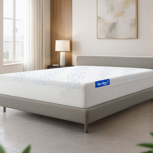 Mattress on a bed in a room with a lamp and window