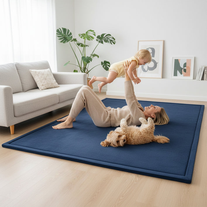 Mother and child playing on a navy tatami floor mat, showing a cushioned tatami mat floor ideal for families.