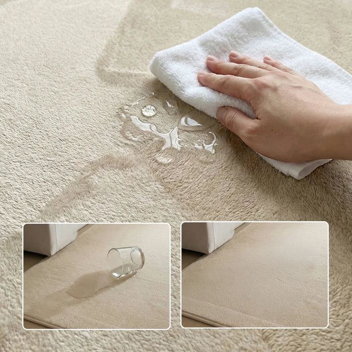 A hand uses a white cloth to blot up water from the Super Sleeper Pro Plush Soft Touch Sensory Tatami Mat. Inset images show a knocked-over glass spilling water and the same area dry and clean, highlighting its easy-clean surface.