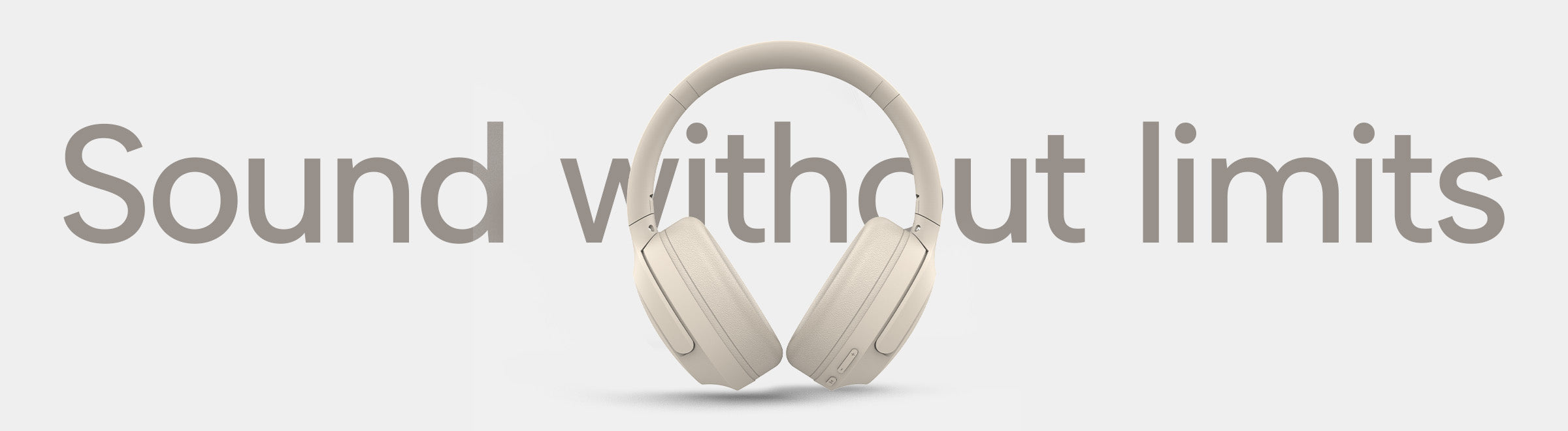 Over-ear beige headphones are centered in front of the phrase “Sound without limits” in large, matching beige letters on a light gray background.