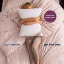 A woman lying on a bed with blush pink bedding, hugging a white ribbed pillow. Text overlays read 'Can't wait to get into bed.