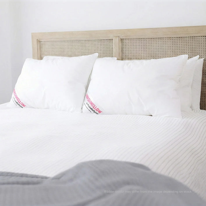 Marshmellow hotel pillows on bed displaying full loft, soft fill, and hotel bedding setup