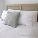 Hotel bed styled with Marshmellow pillows highlighting premium white pillow design and comfort