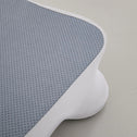 Non slip bottom surface of ergonomic back support pillow