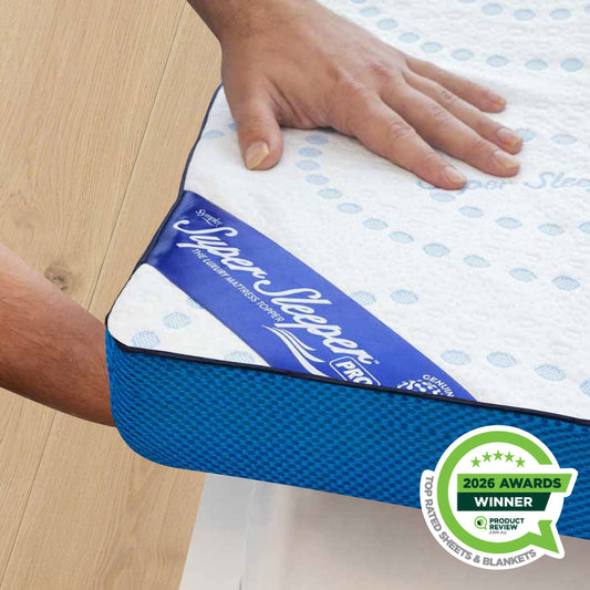 Sleep Sleeper mattress topper with a hand touching it on a wooden floor, featuring an 'Awards Winner' badge.