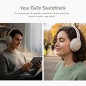 Indoors, a man uses a tablet on the couch wearing Kleva® AudioUltra Noise Cancelling Wireless Bluetooth Headphones by Kleva Range; outdoors, a woman smiles, eyes closed, also enjoying premium sound with the same headphones.