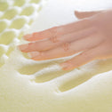 Hand leaving a mark in memory foam